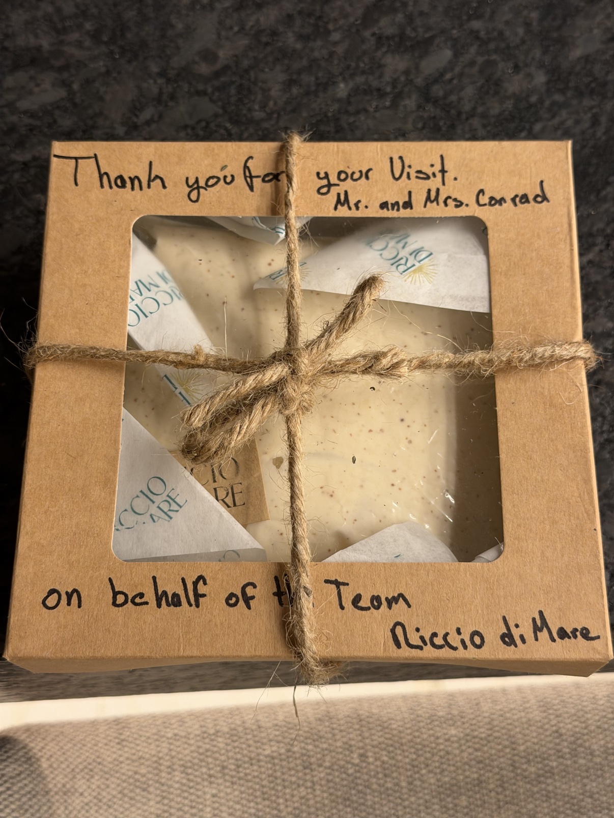 Twine-tied gift box of homemade Caesar dressing, hand-addressed to Mr. and Mrs. Conrad.