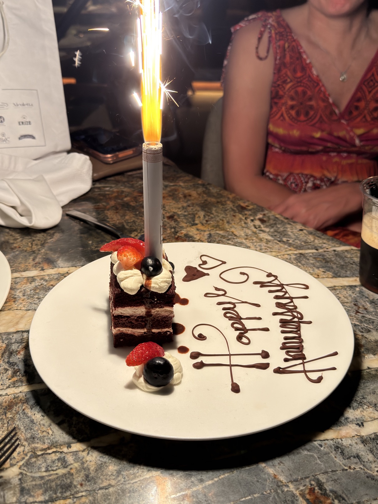 Red velvet cake and a sparkler for our anniversary.